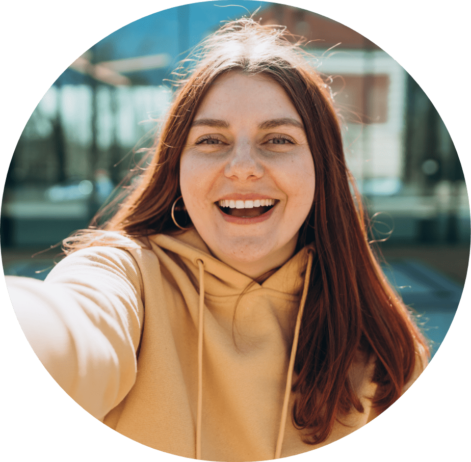 Woman smiling taking a selfie